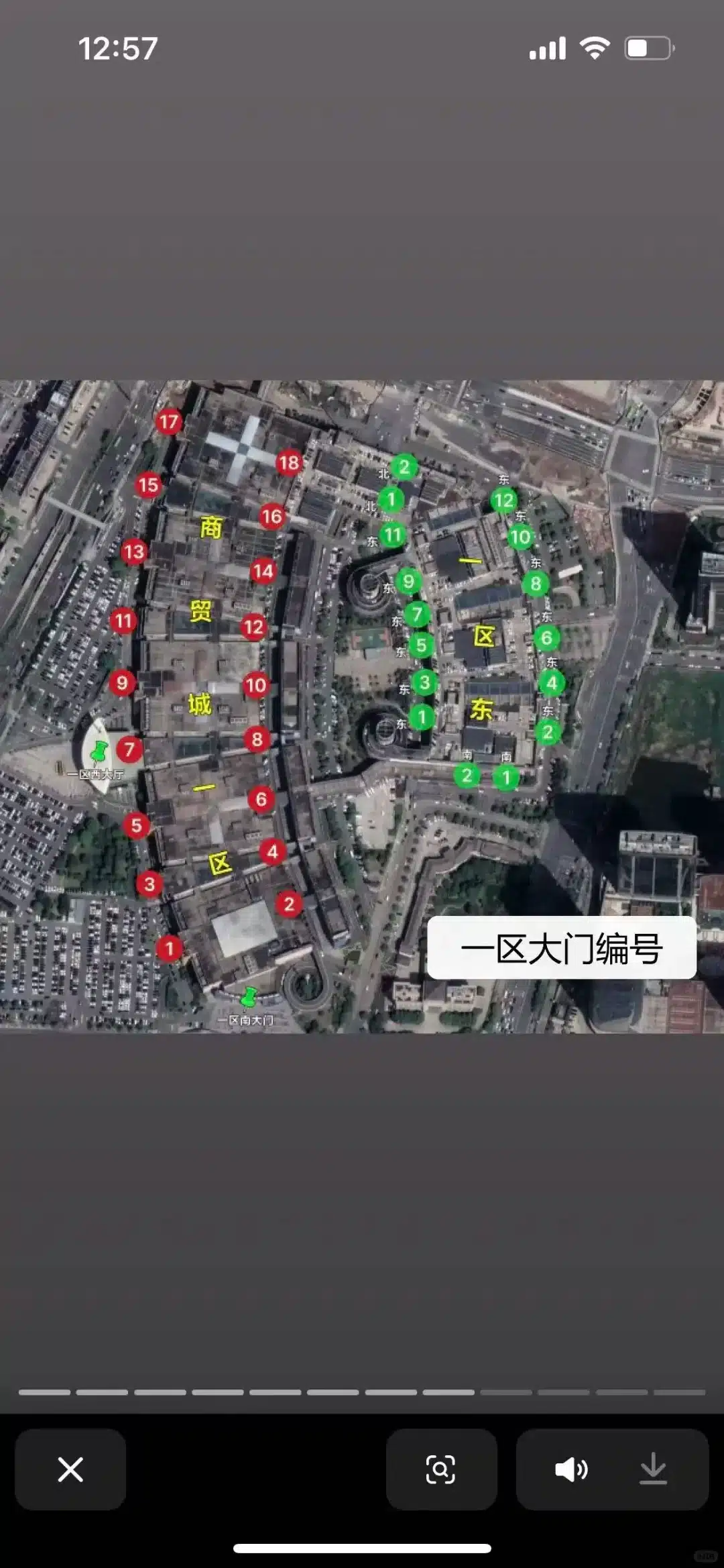 A satellite map showing a complex with labeled sectors and numbered points in red and green, indicating different areas or buildings.