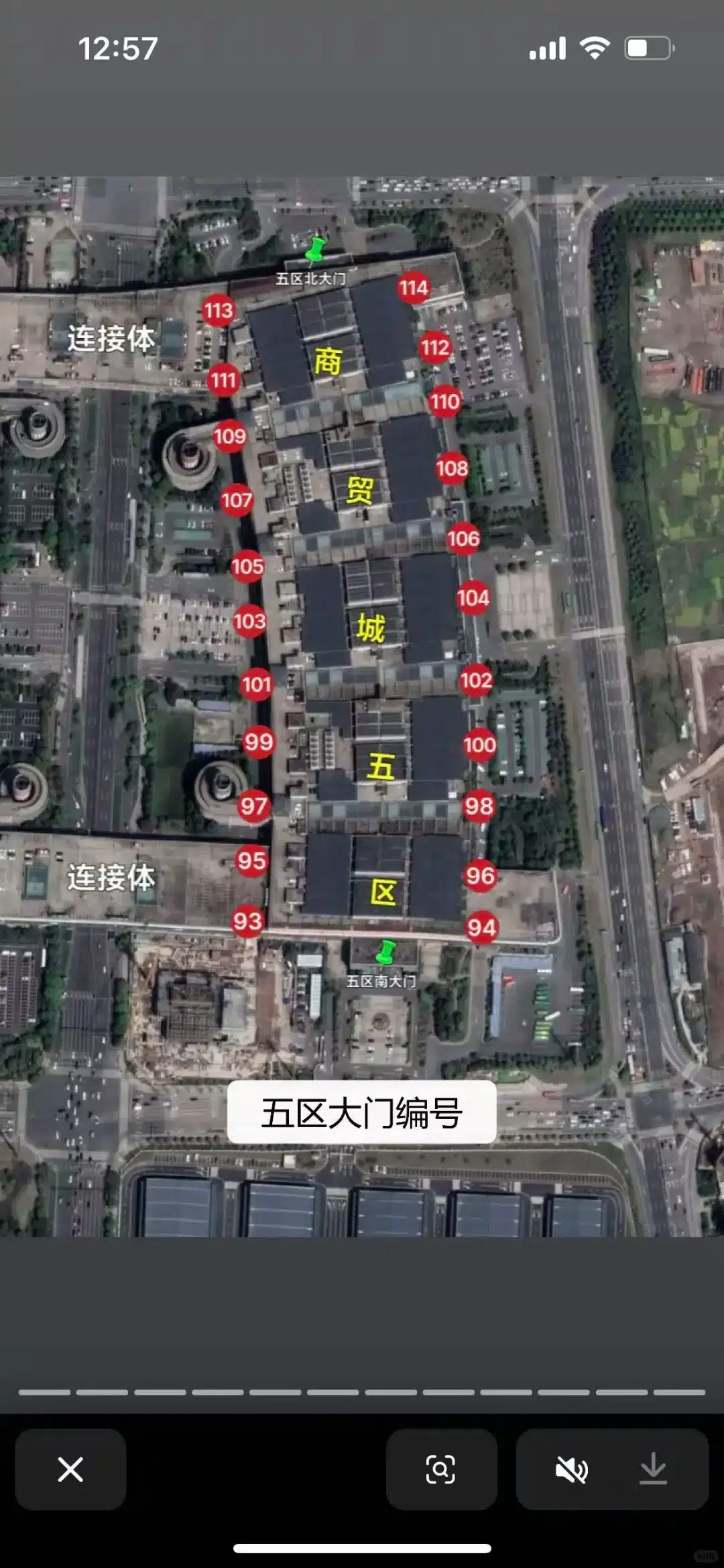Close-up of a satellite map showing numbered sections marked in red, with visible structures and roads. Text in Chinese labels areas.