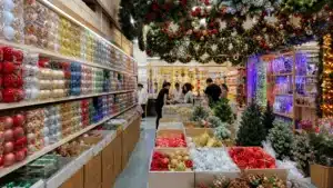 wholesale Christmas decorations on display at a Chinese wholesale market booth